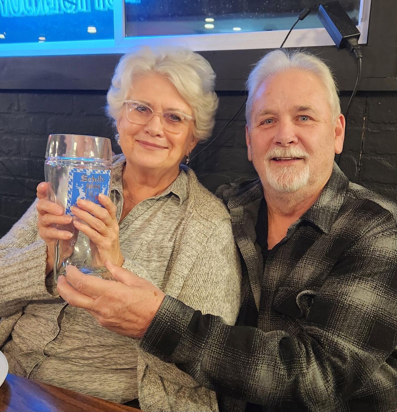 Regulars sharing a toast at The Hound
